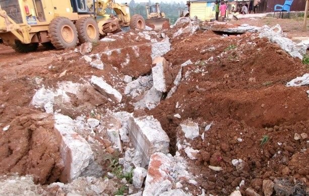 Dadieso-Akontombra Road construction site with equipment in the Western North Region by Kingspok Construction Works Limited